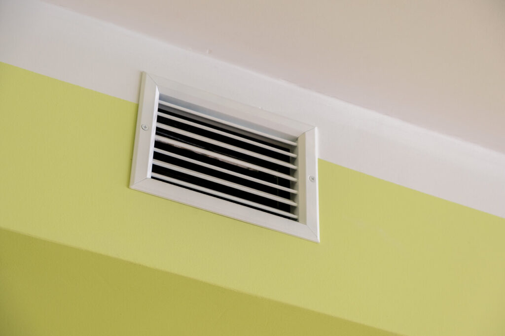 Ventilation shaft with air grates on the ceiling.